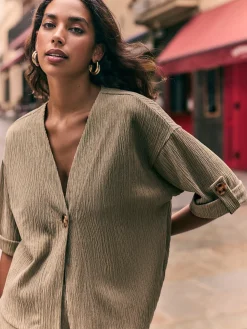 CAMISA DETALLE BOTON