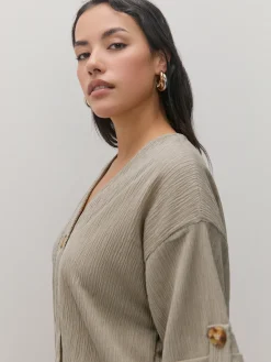 CAMISA DETALLE BOTON