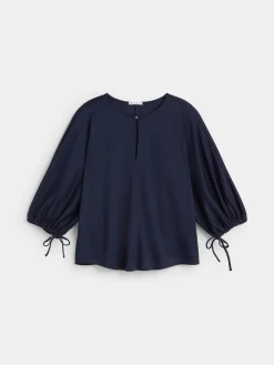 CAMISETA MANGA ABULLONADA
