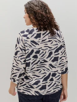 CAMISETA RANGLAN ESTAMPADA