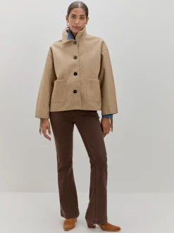 CHAQUETA LARGA FLECOS